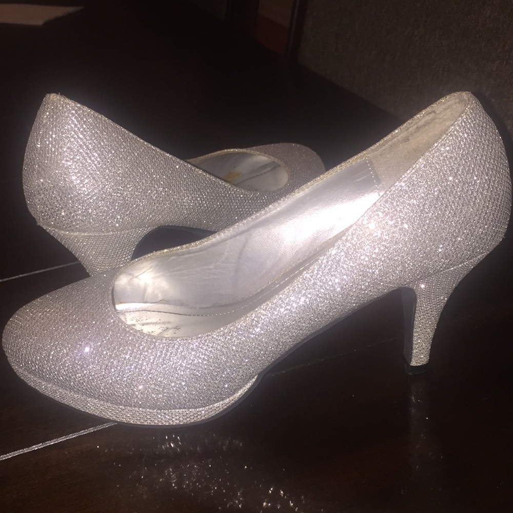 Silver sparkling short heels.